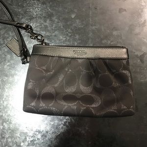 Coach wristlet. Excellent condition. Silver.